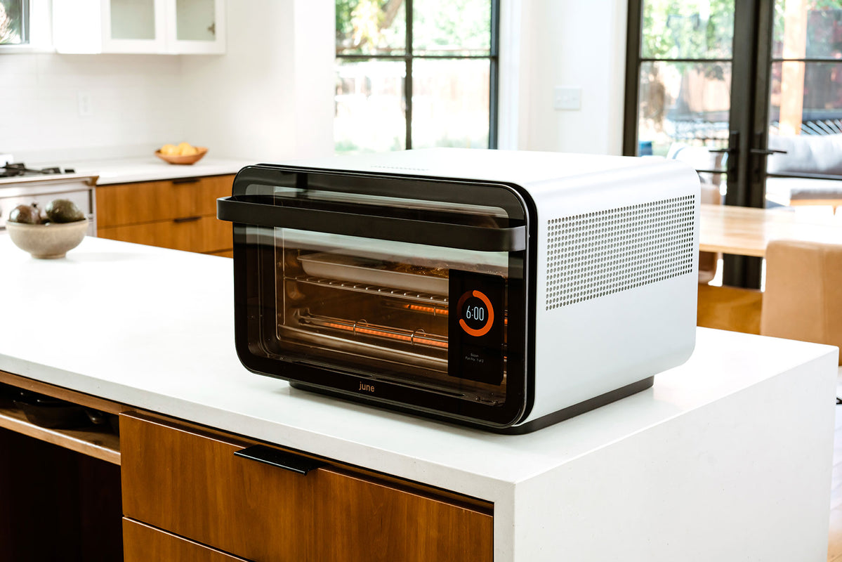 June oven on a white countertop in a kitchen