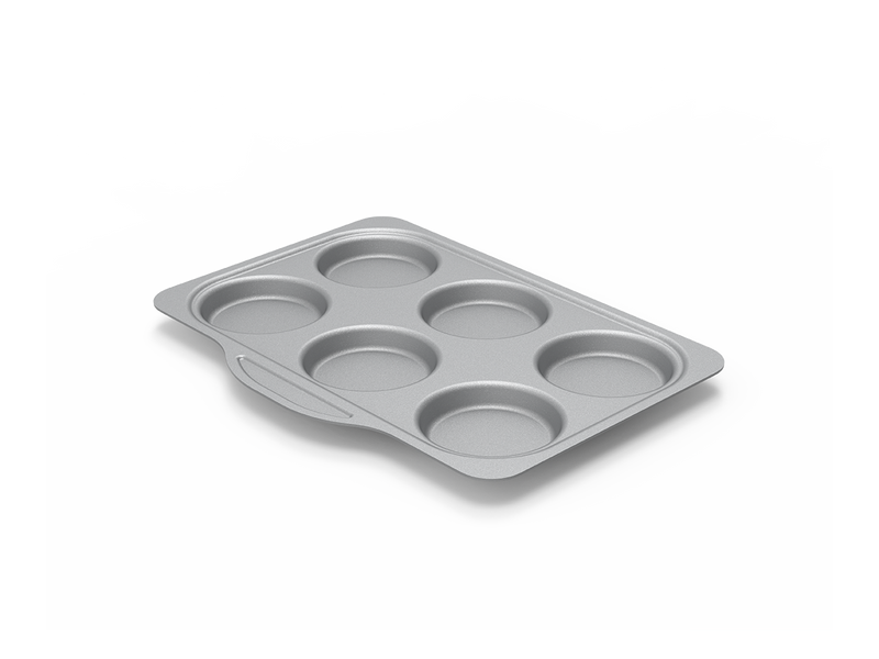 A tray-like baking pan with two rows of three wells. There is a tab-like protrusion on one long edge of the pan, with a slight indentation to grip.